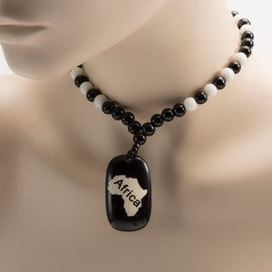 African Map Pendant On Black And White Beads Necklace