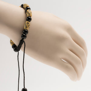 African Black & Cream Beads Bracelet With Cultural Carving
